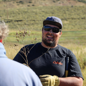Photo of Weeds Division Staff teaching residents about noxious weeds in Summit County. 